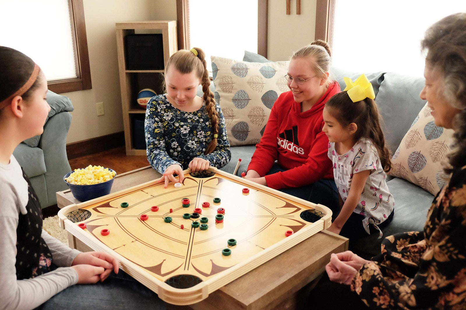 Carrom brand large carrom board game set with striker and coins, suitable for adults and children for indoor fun and entertainment.
