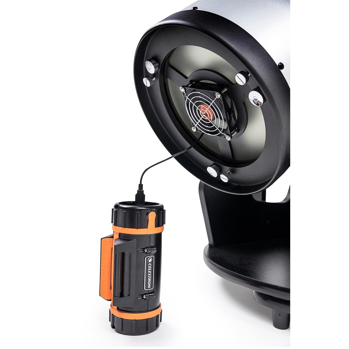 Celestron USB cooling fan for Dobsonian telescopes attached to telescope tube, helping reduce heat and improve viewing clarity.