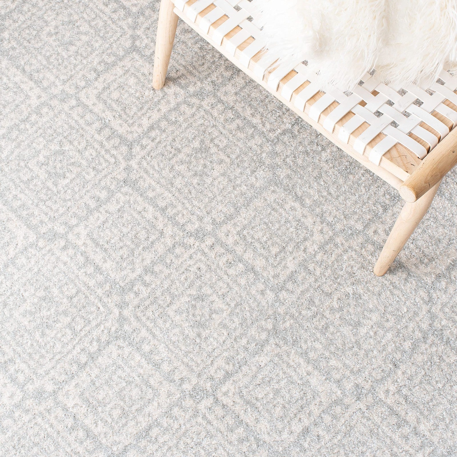 Light grey and ivory Moroccan boho runner rug from Safavieh Tulum Collection, 2x9 feet, with intricate geometric patterns.