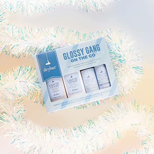 Drybar Glossy Gang On-the-Go Kit with frizz control and shine travel set, including small bottles and styling tools for sleek hair.