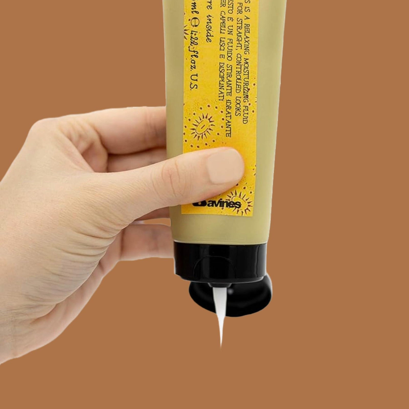 Davines This is a Relaxing Moisturizing Fluid with heat protection and frizz control, shown in a sleek bottle with a pump dispenser.