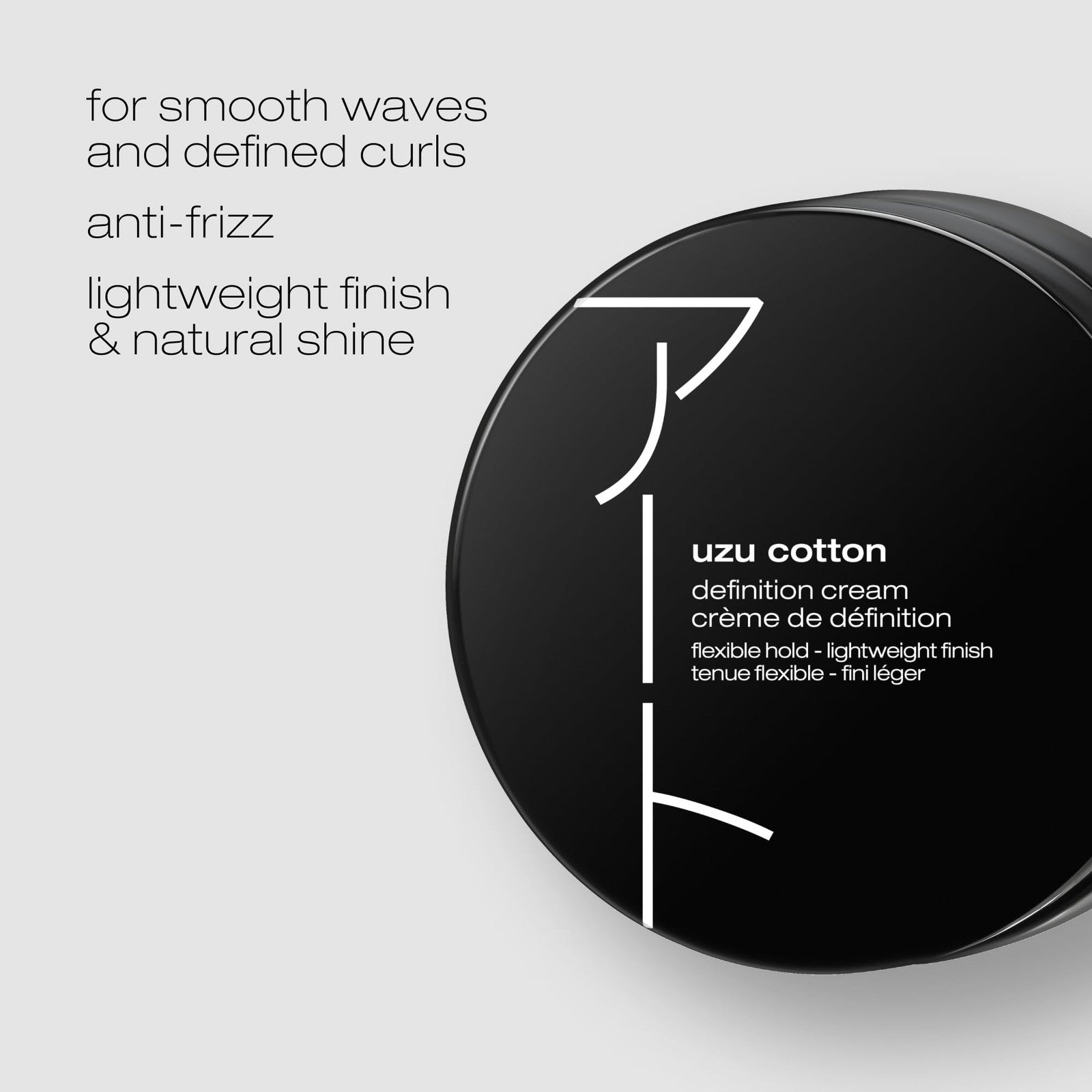 shu uemura art of hair Uzu Cotton Definition Cream jar showing the anti-frizz, flexible hold styling cream with white packaging and product label