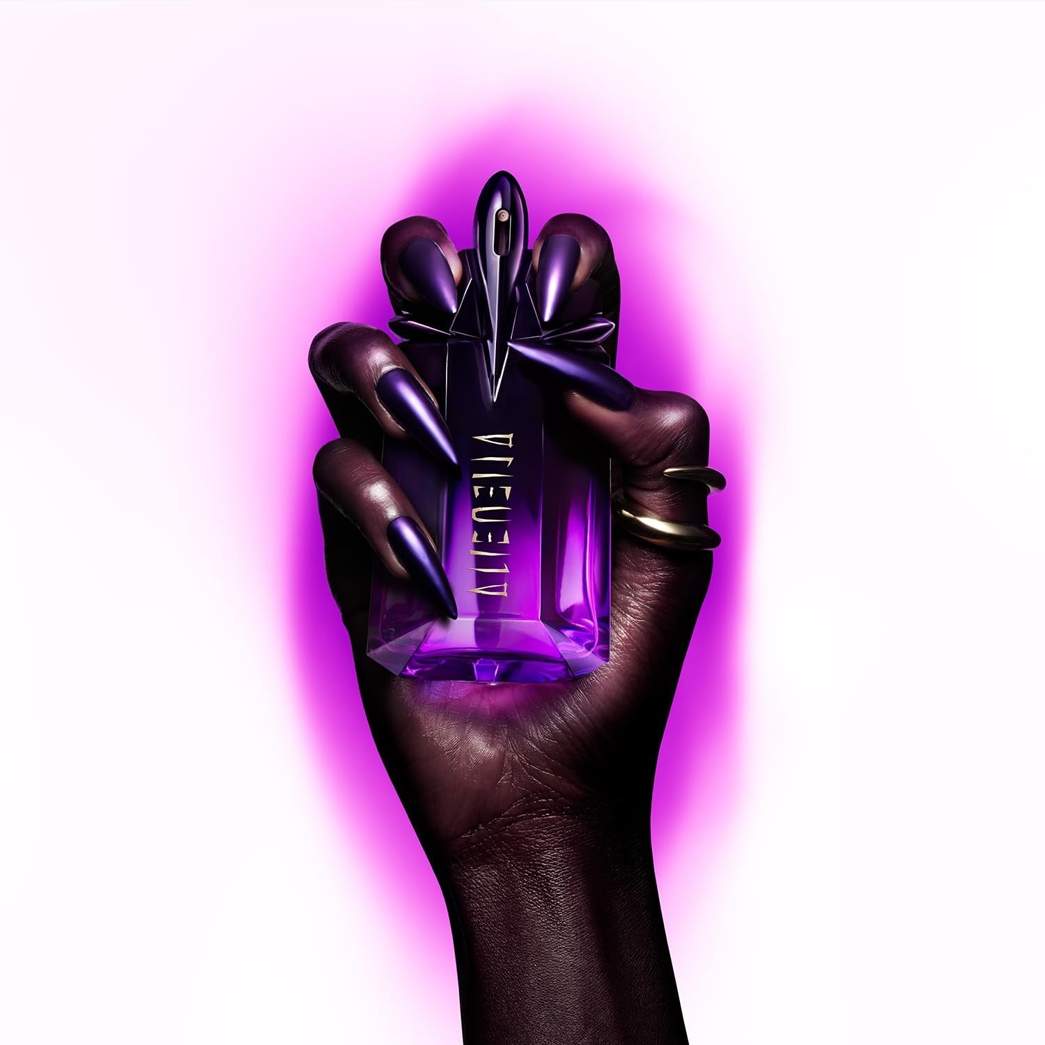 Mugler Alien Extraintense EDP perfume for women with floral scent, showcasing the perfume bottle and packaging.