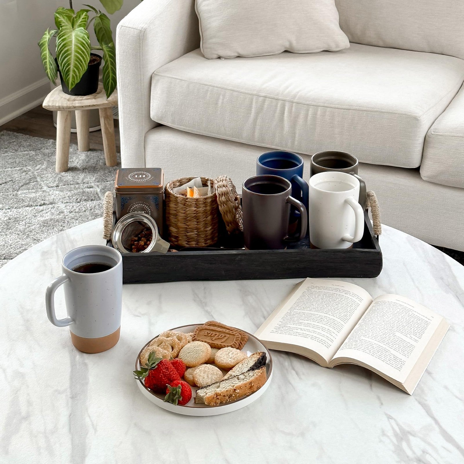 Large Mora Ceramics Hit Pause tea mug with loose leaf infuser, ceramic mug featuring a modern design and a built-in infuser for brewing.