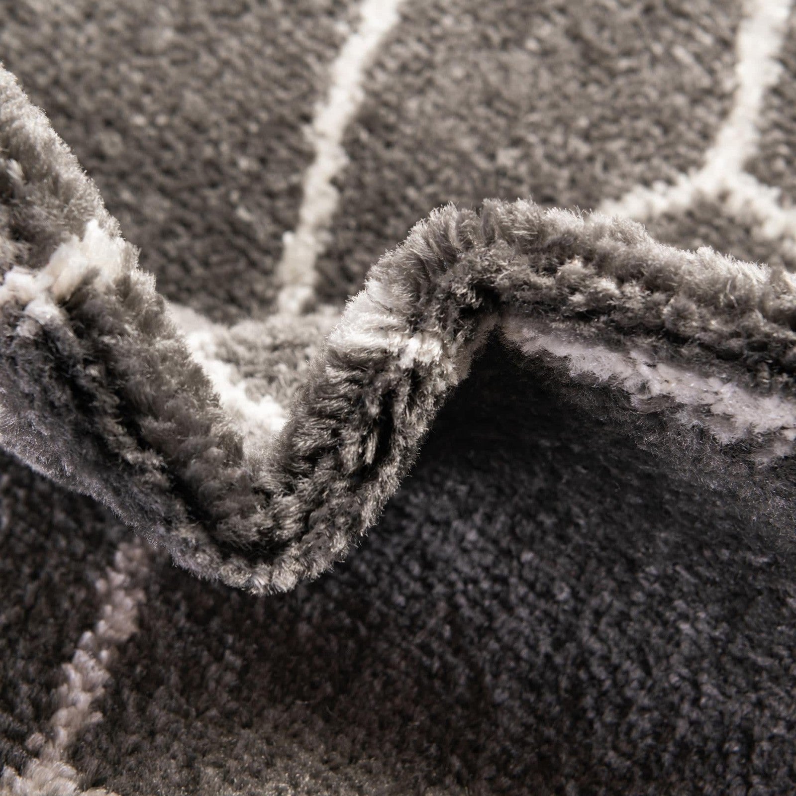Dark gray geometric round area rug from Unique Loom Trellis Frieze Collection with a modern trellis pattern.