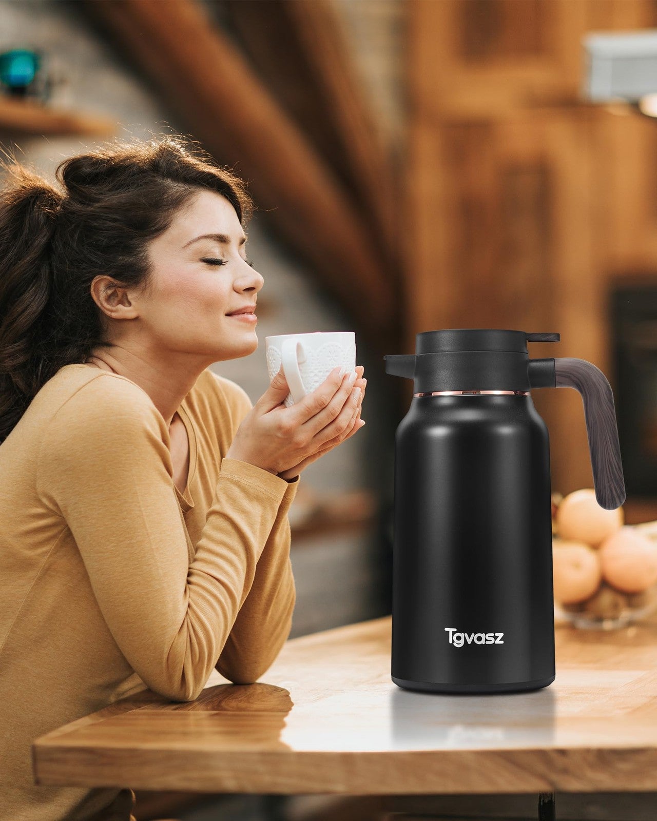Two stainless steel Tgvasz 70 oz thermal coffee carafes with handles, designed to keep coffee hot for 36 hours.
