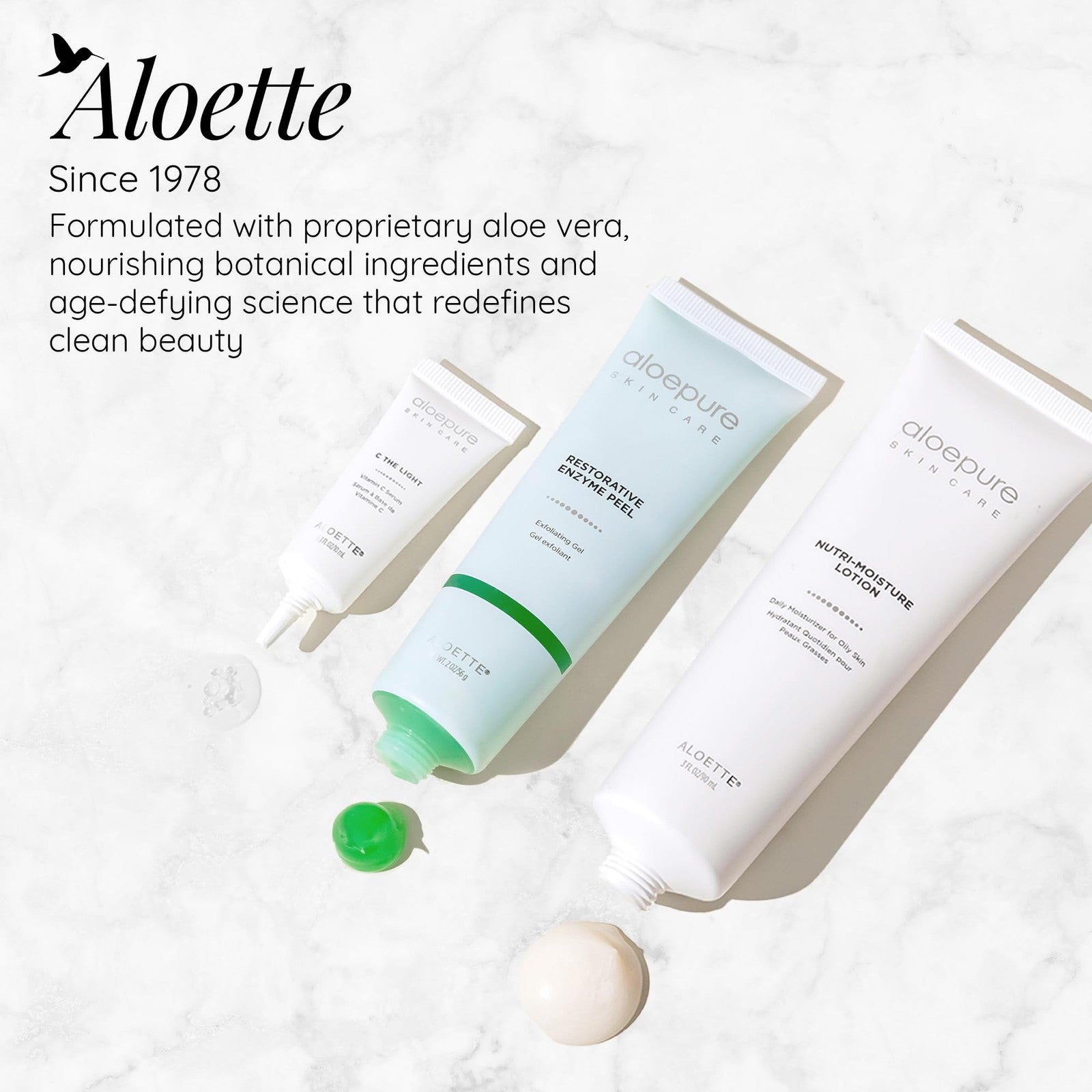 Aloette Restorative Enzyme Face Peel Gel in a 2 oz tube, showing the creamy exfoliating gel with a smooth surface and product label.