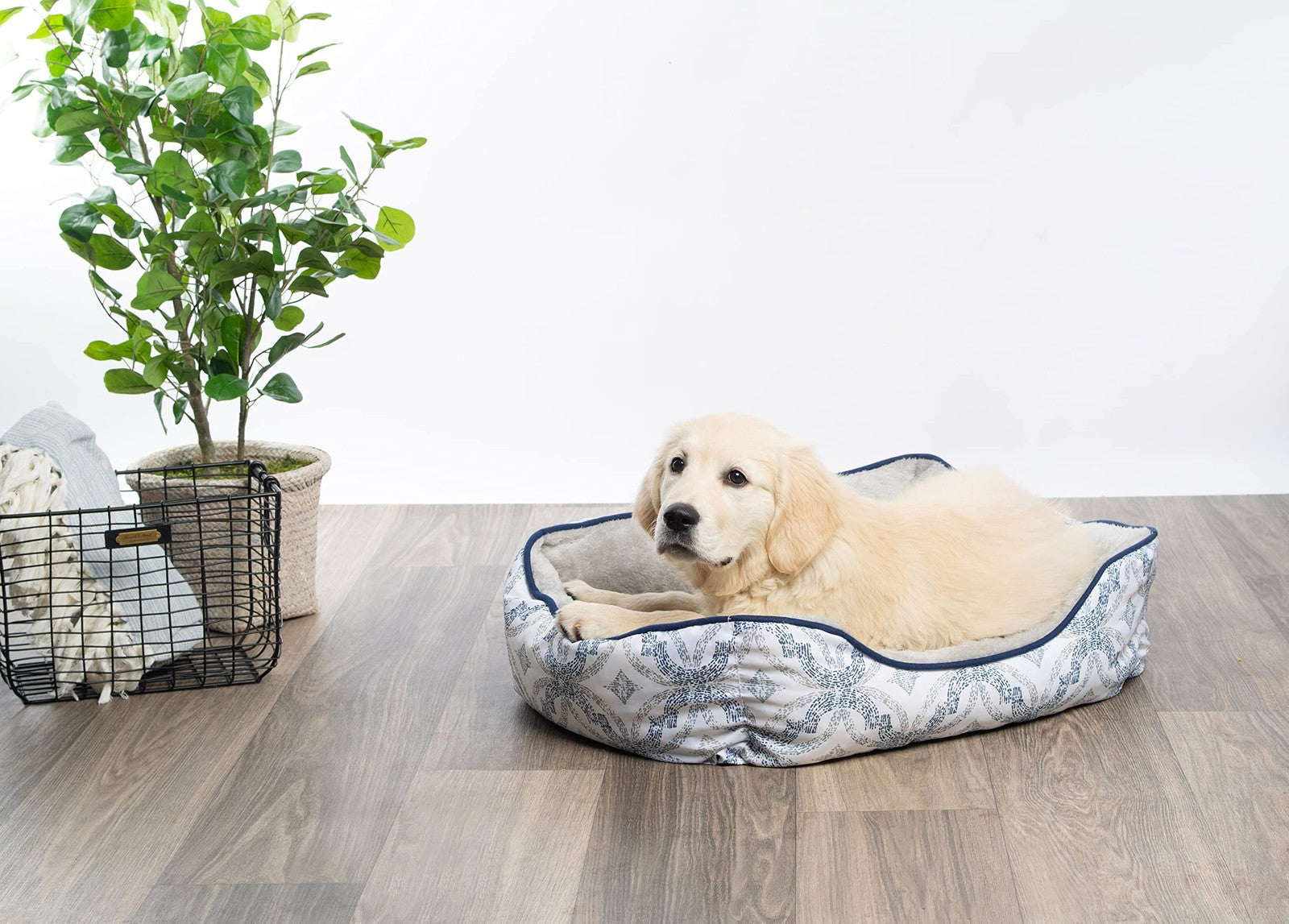 Modern Threads luxury dog bed in Oxford printed plush, cozy cuddler design for small to medium-sized dogs.