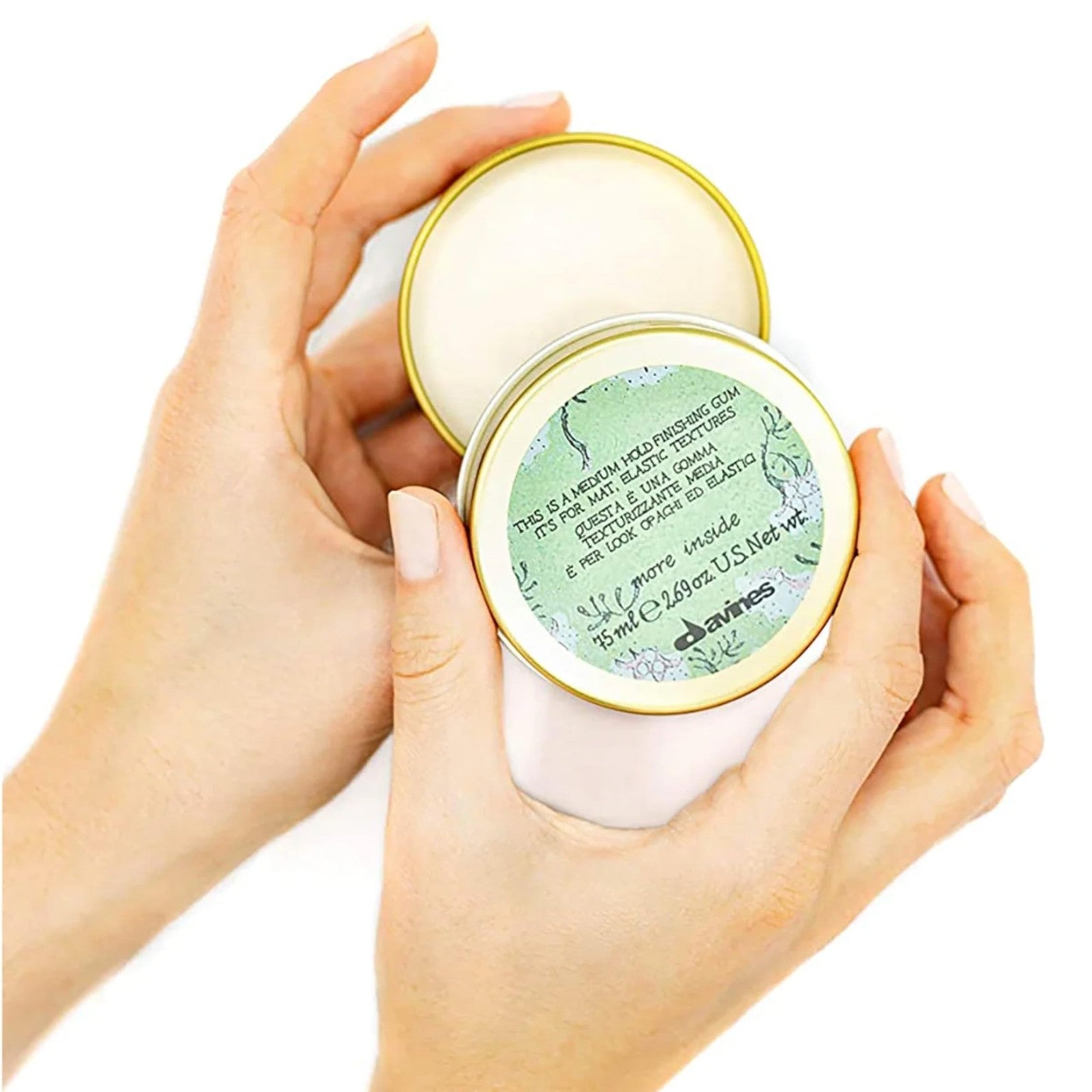 Davines This Is A Medium Hold Finishing Gum showing a clear jar of lightweight, residue-free styling product with a black lid