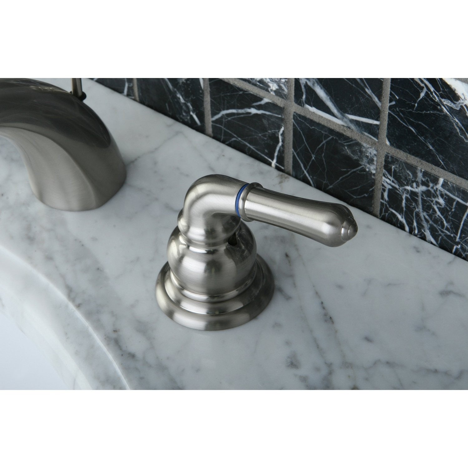 Kingston Brass KB958KL mini-widespread bathroom faucet in brushed nickel, with two handles and modern design for bathroom sinks.