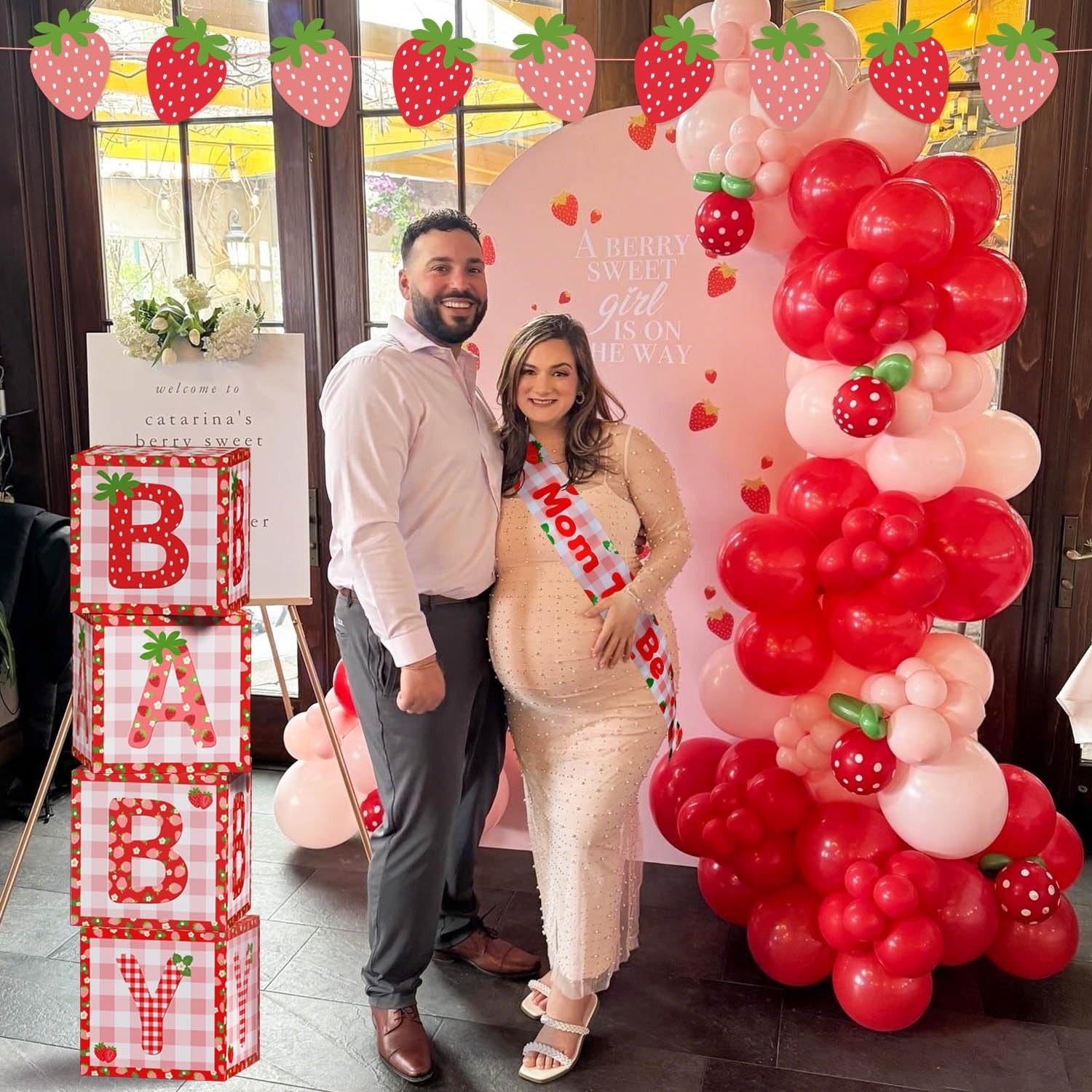 Lopeastar 114-piece strawberry-themed baby shower decorations kit with balloons, arch banner, sash, and gift boxes.