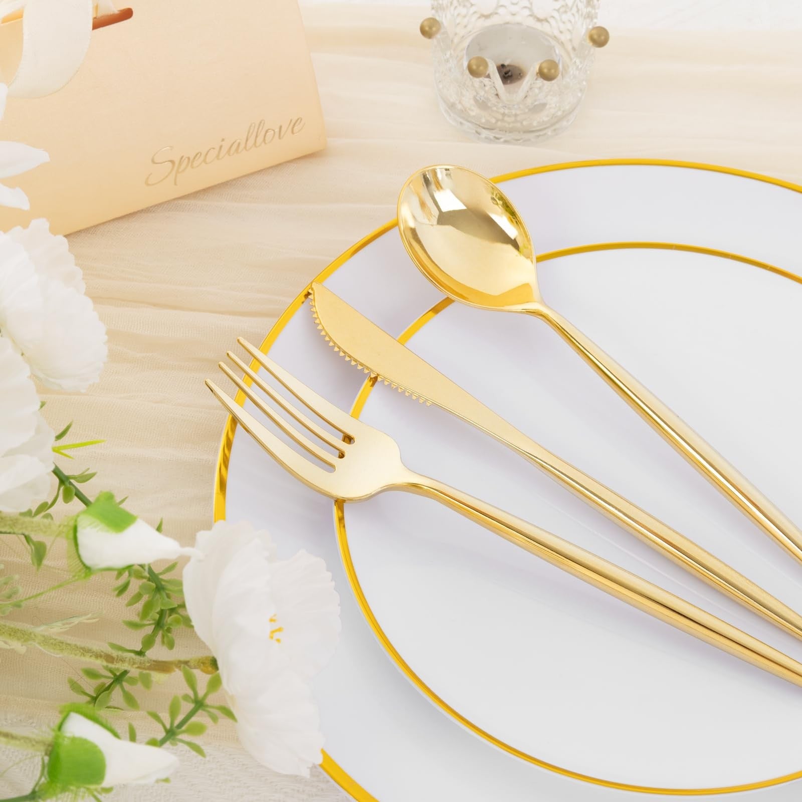 Set of 180 white and gold plastic party plates by ejonirinjonir, featuring elegant gold accents for special occasions.