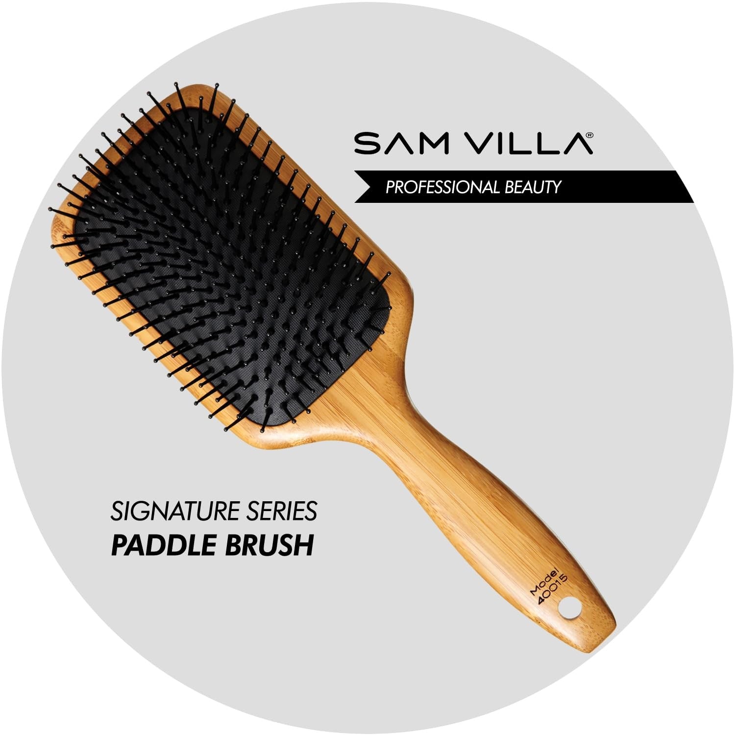 Sam Villa Signature Series bamboo wooden paddle brush for hair styling, featuring natural bristles and ergonomic handle.