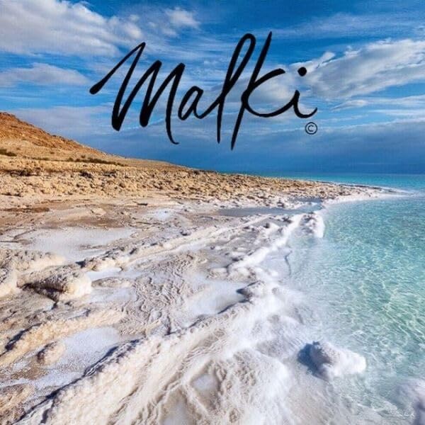 Salt body scrub with Dead Sea minerals and frankincense from J. Malki Products Malki Dead Sea collection, showing the textured scrub in a jar.