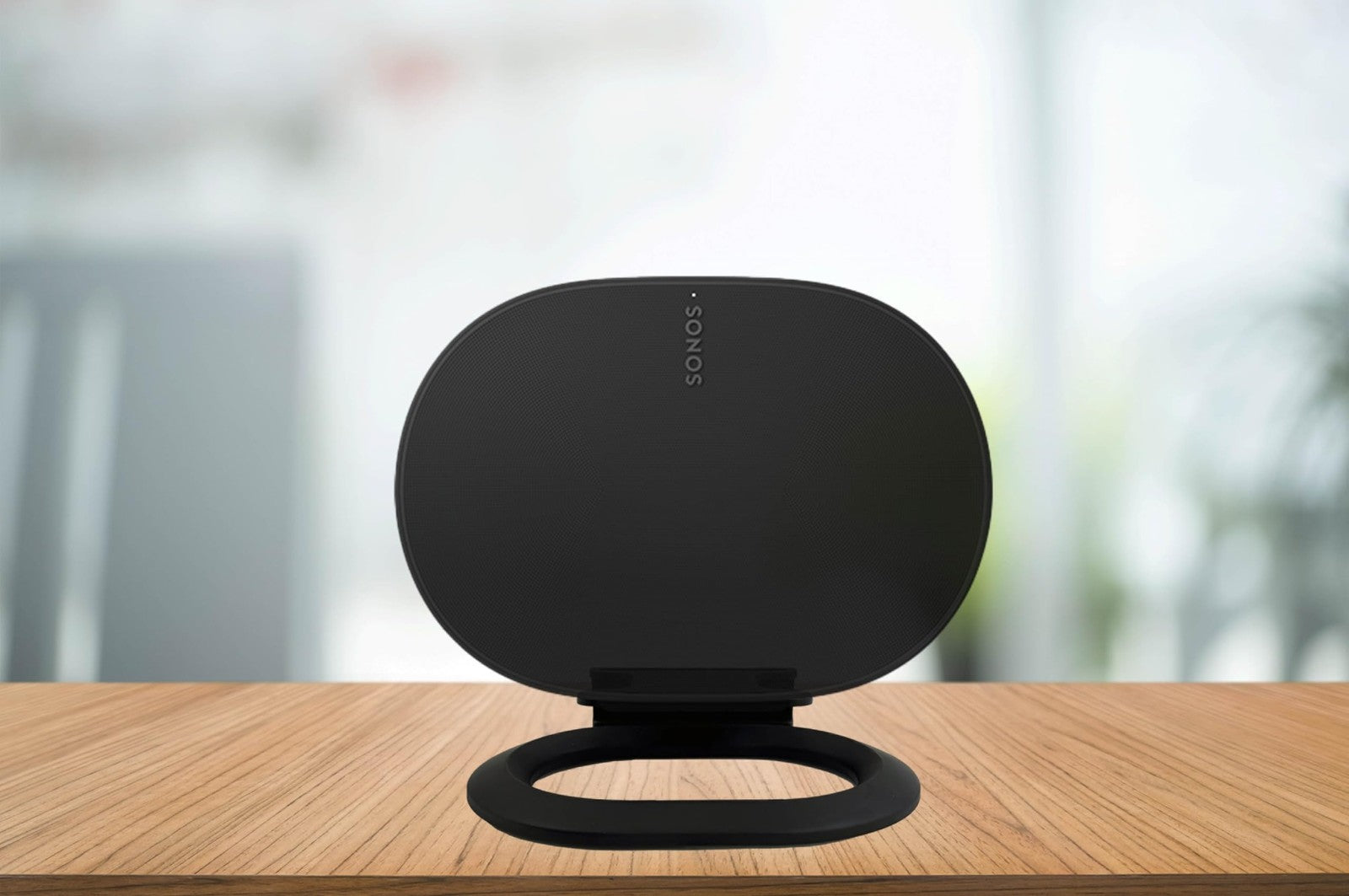 White Flexson desk stand designed for Sonos ERA 300, securely holding the speaker on a desktop surface.