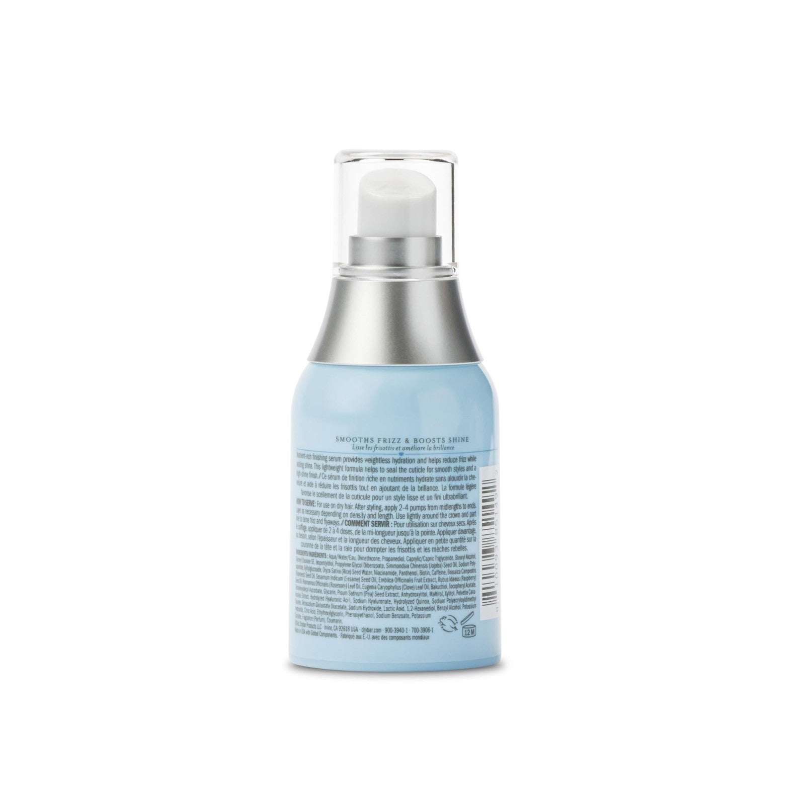 Drybar Liquid Glass high-gloss finishing serum applied to smooth, shiny hair after blowout, reducing frizz and adding sleekness.