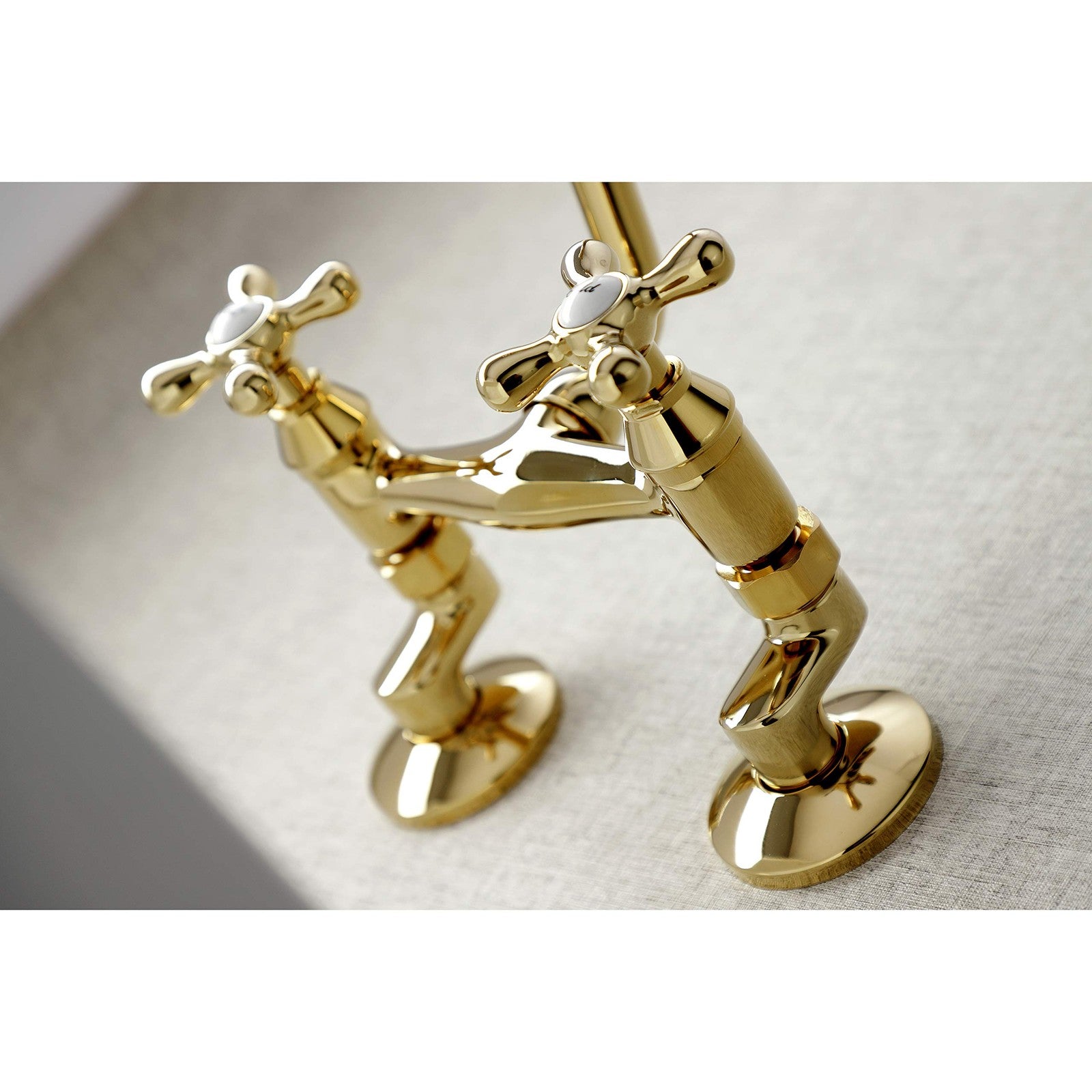 Victorian Kingston Brass KS213PB wall mount kitchen faucet with two handles and 7-inch spout, polished brass finish, traditional design