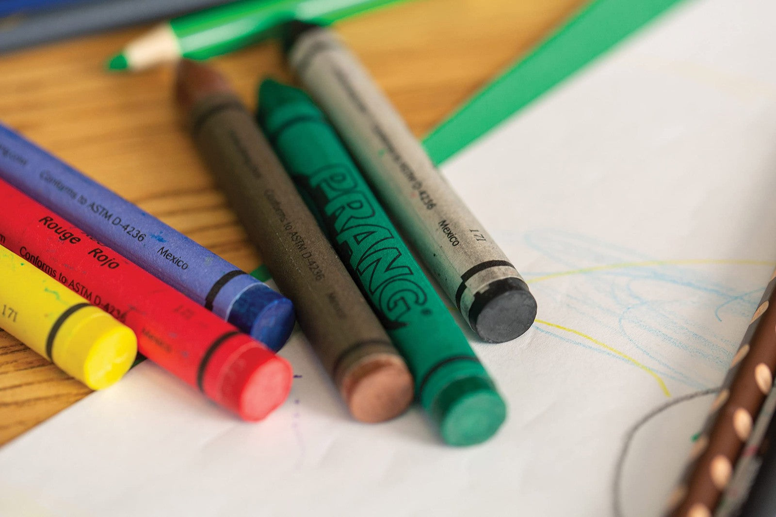 Prang soy-based crayons in 8 colors, 100 each, displayed in a carton, ideal for art and coloring projects.