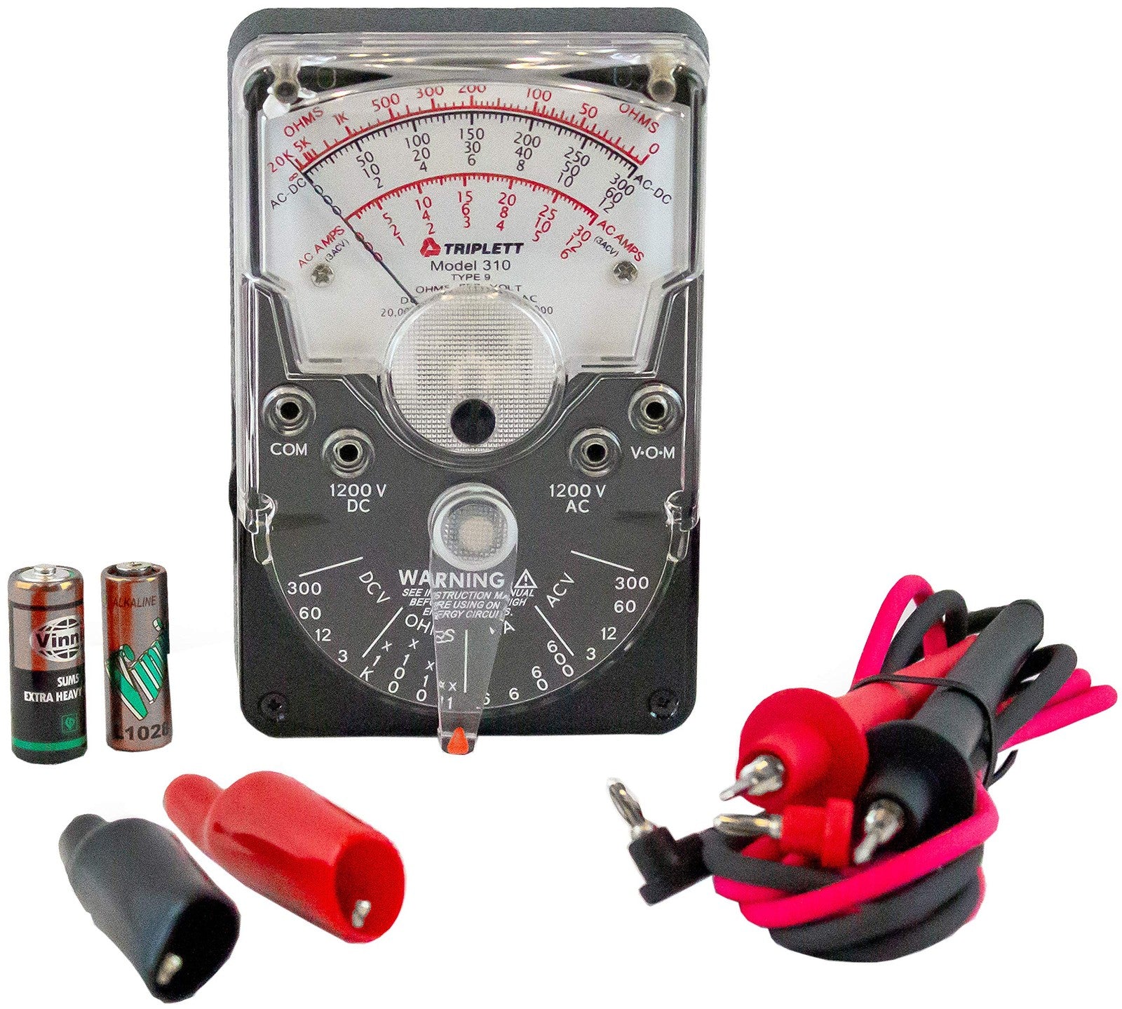Triplett 3018 Model 310 hand-sized analog multimeter displaying AC/DC voltage and DC current readings.