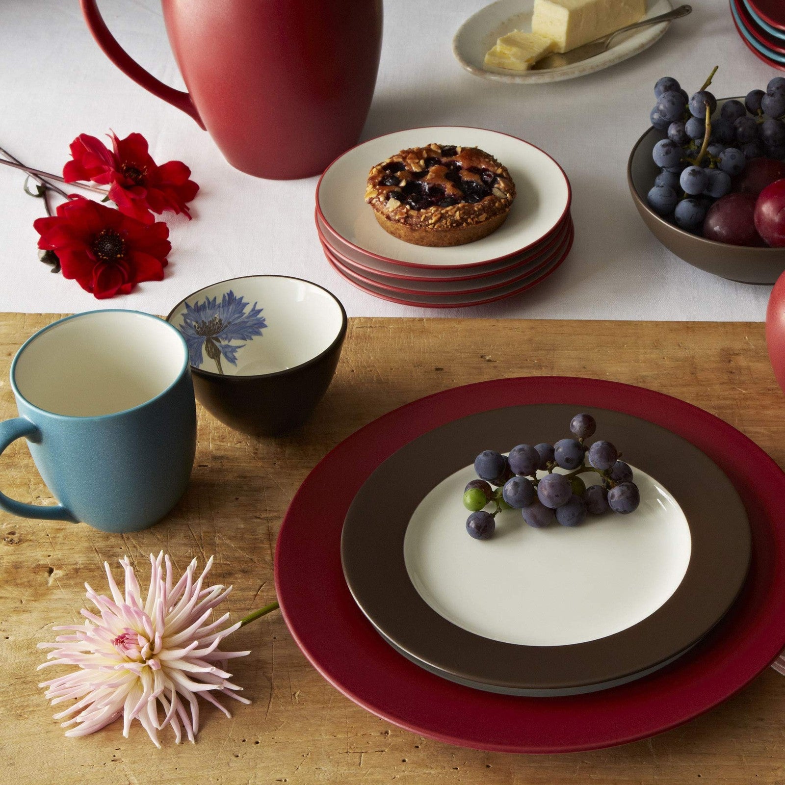 Noritake Colorwave Raspberry pasta serving bowl, 12-inch size with 89.5 oz capacity, featuring a vibrant raspberry-colored ceramic design.