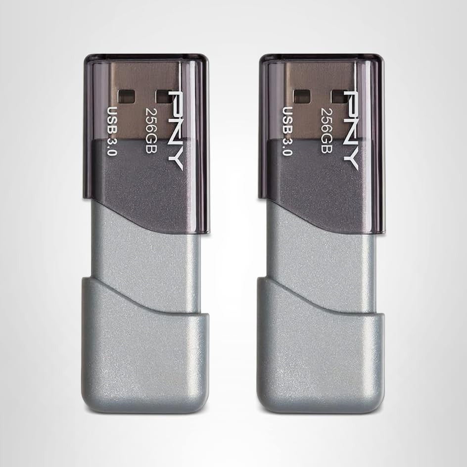 PNY Turbo Attaché 3 USB 3.0 flash drives, 256GB capacity in silver, shown in a pair for fast data transfer and portable storage.