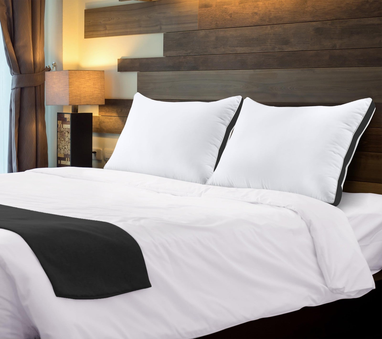 Set of two Utopia Bedding queen size black bed pillows with soft, fluffy filling, perfect for comfortable sleeping.