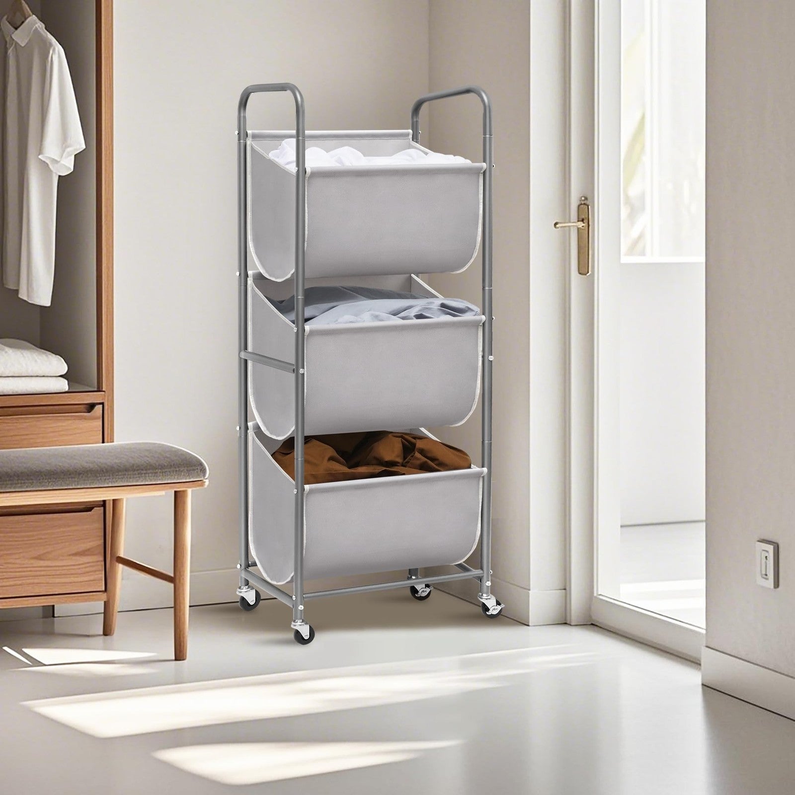 Storage Maniac 120L vertical rolling laundry hamper with three compartments, featuring a sturdy design and easy-to-move wheels.