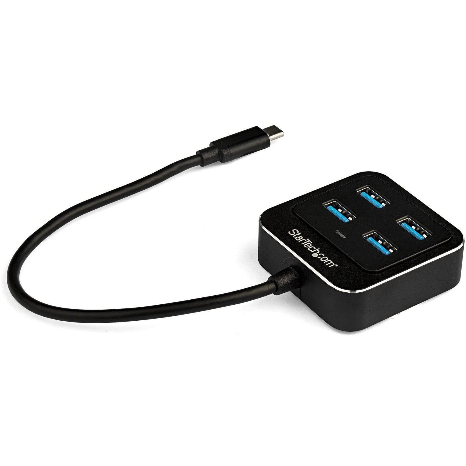 StarTech.com 4-Port USB-C Hub with USB-A ports, showing the compact black hub connected to a device with four USB-A cables