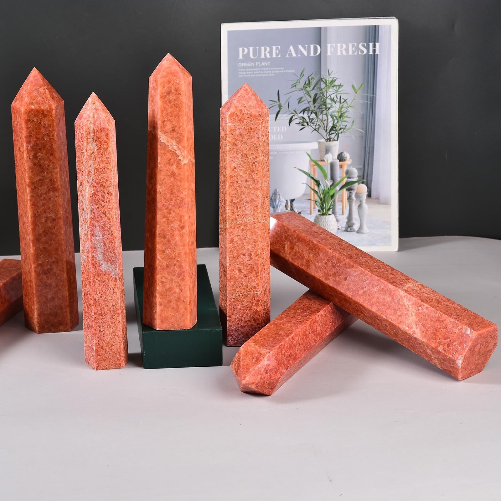 Large Sunstone obelisk tower from JIC Gem featuring a 6-facet natural healing crystal wand with vibrant orange and gold hues.