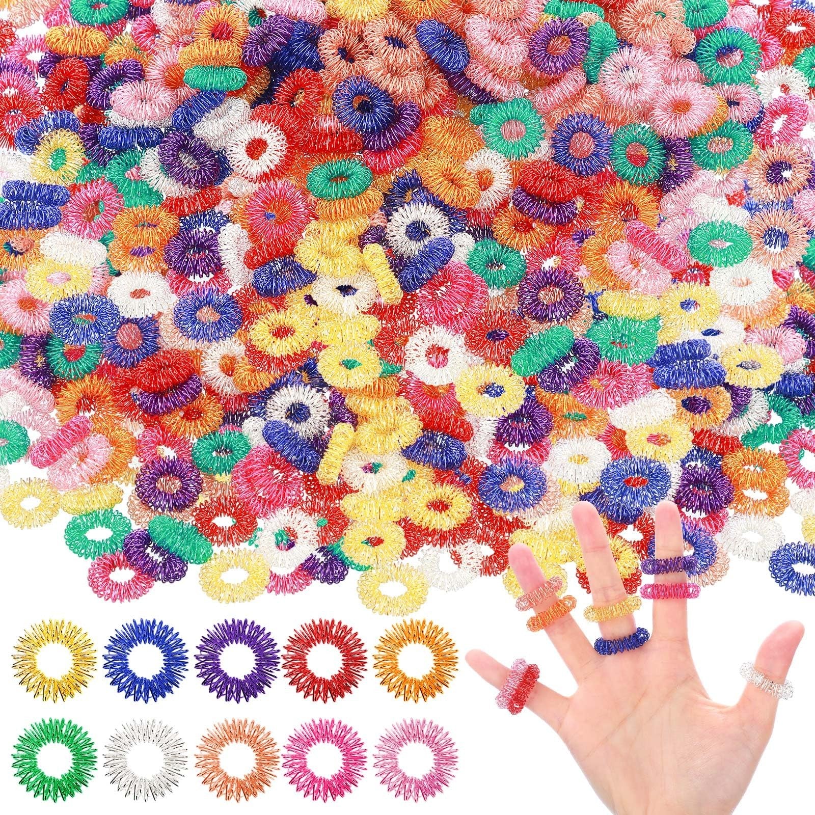 Nuogo 500 pcs acupressure spiky finger rings for stress relief, sensory stimulation, and finger massage.