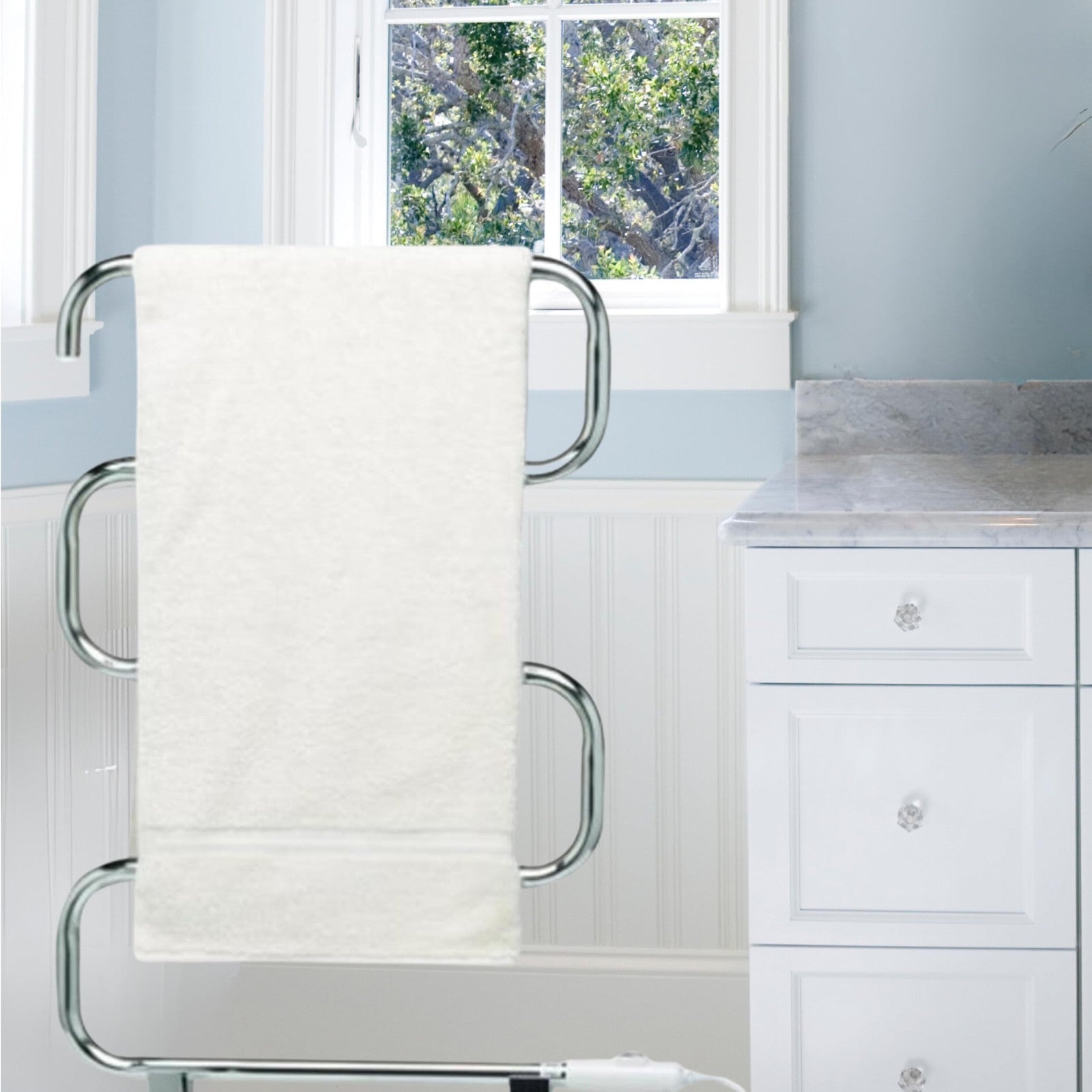 Warmrails Classic towel warmer rack, free-standing or wall-mounted, with polished chrome finish and multiple bars for drying towels.