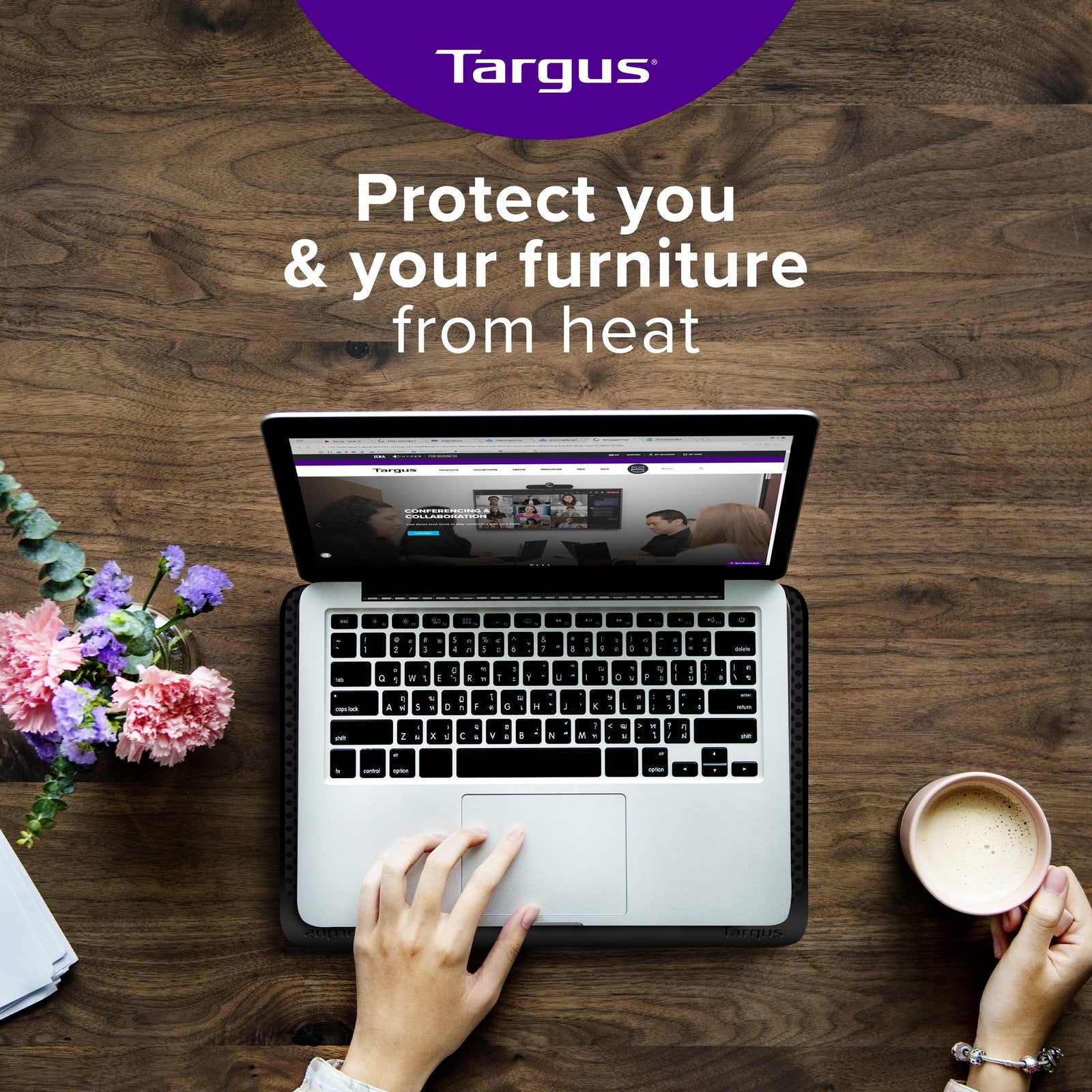 Black Targus Chill Mat for up to 16-inch laptops with ergonomic design and cooling vents, shown on a flat surface.