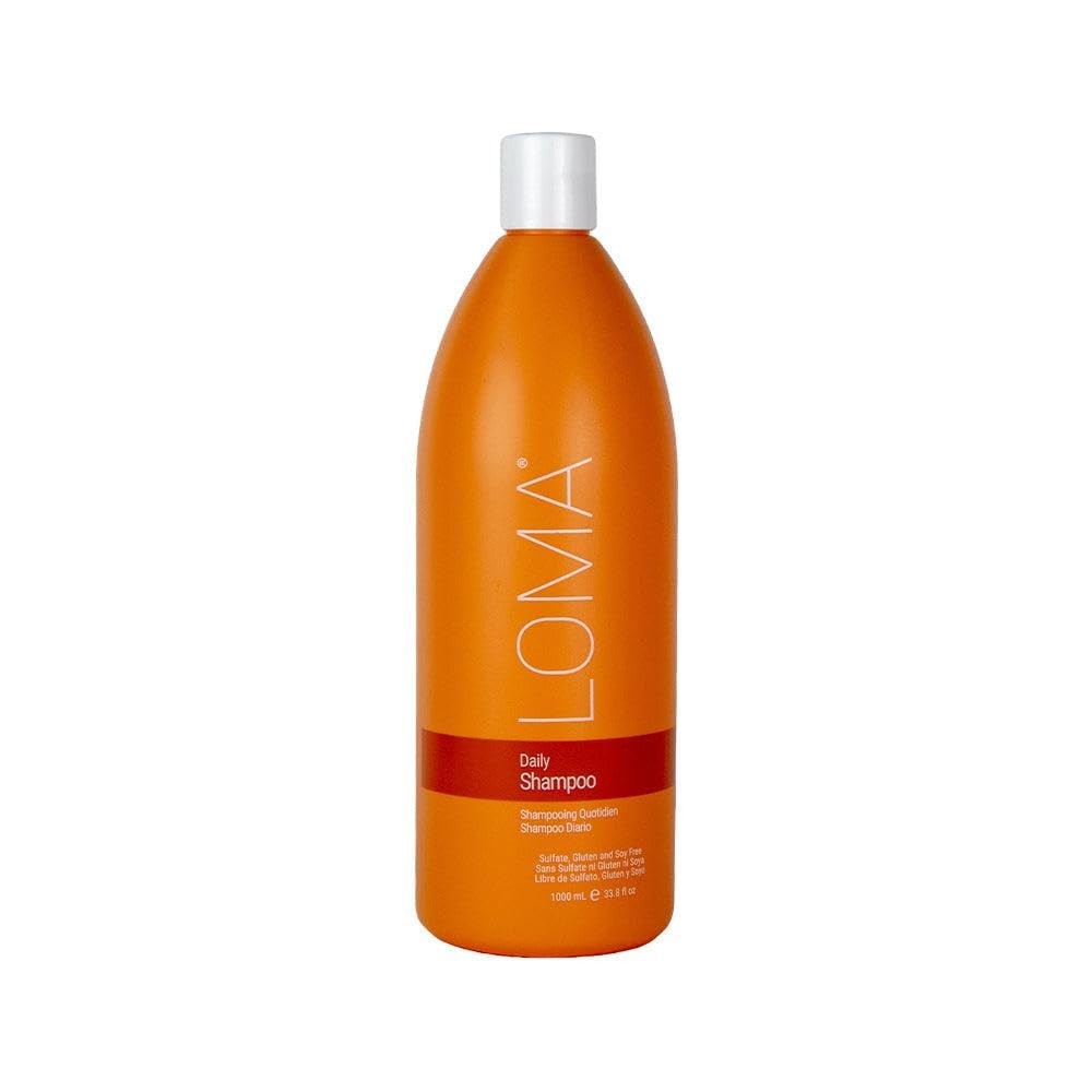 Loma Daily Shampoo in a 33-ounce bottle with a pump dispenser, featuring a sleek white and blue design for daily hair cleansing.