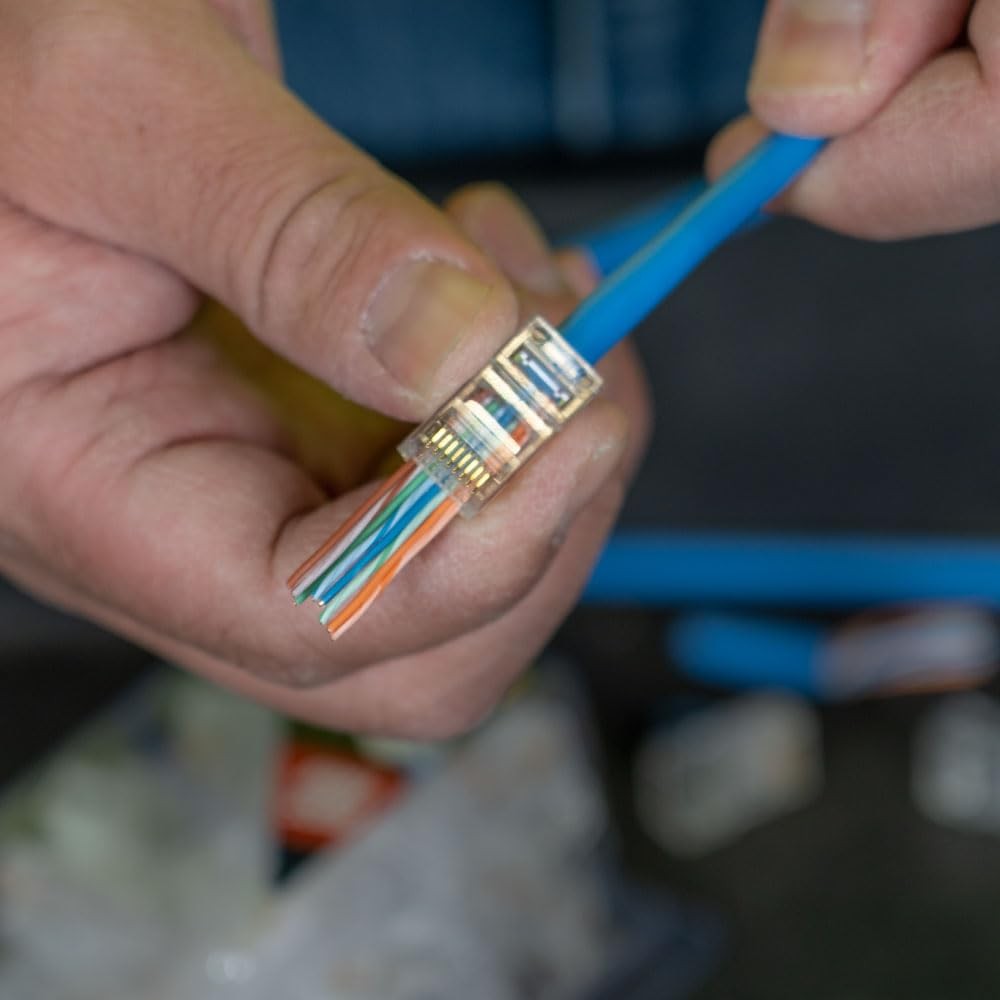Klein Tools VDV826-702 Pass-Thru Modular Data Plug with RJ45 CAT5E GoldConnectors, showing gold-plated Ethernet connectors