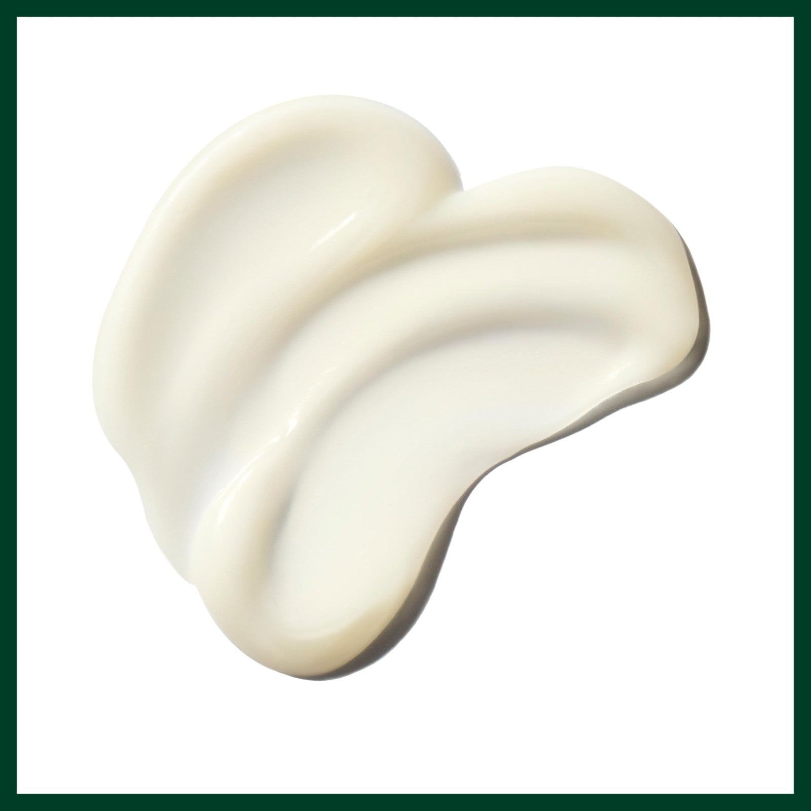 Aveda Be Curly Advanced Co-Wash bottle with curly hair close-up, showcasing hydrating and curl-enhancing features for curly and coily hair.