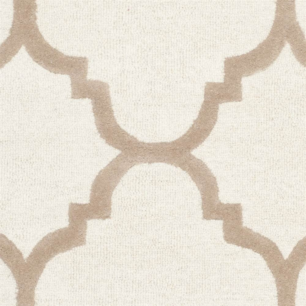 Handmade Safavieh Cambridge Moroccan rug, 5x8 feet, ivory and beige color, with intricate geometric patterns.