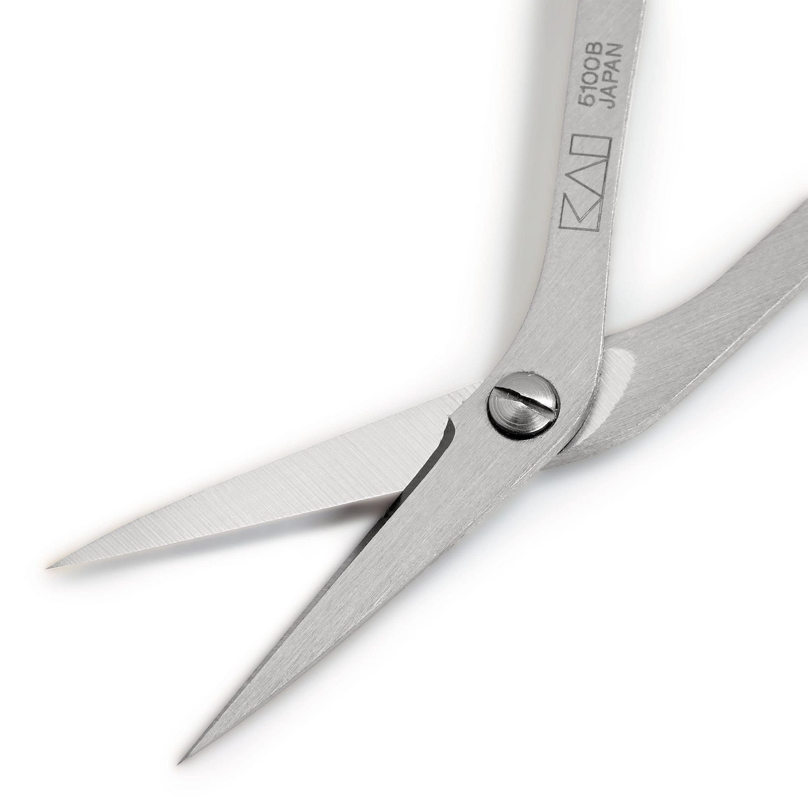 Prym Professional 4-inch curved embroidery scissors in purple with sharp blades for precise fabric cutting.