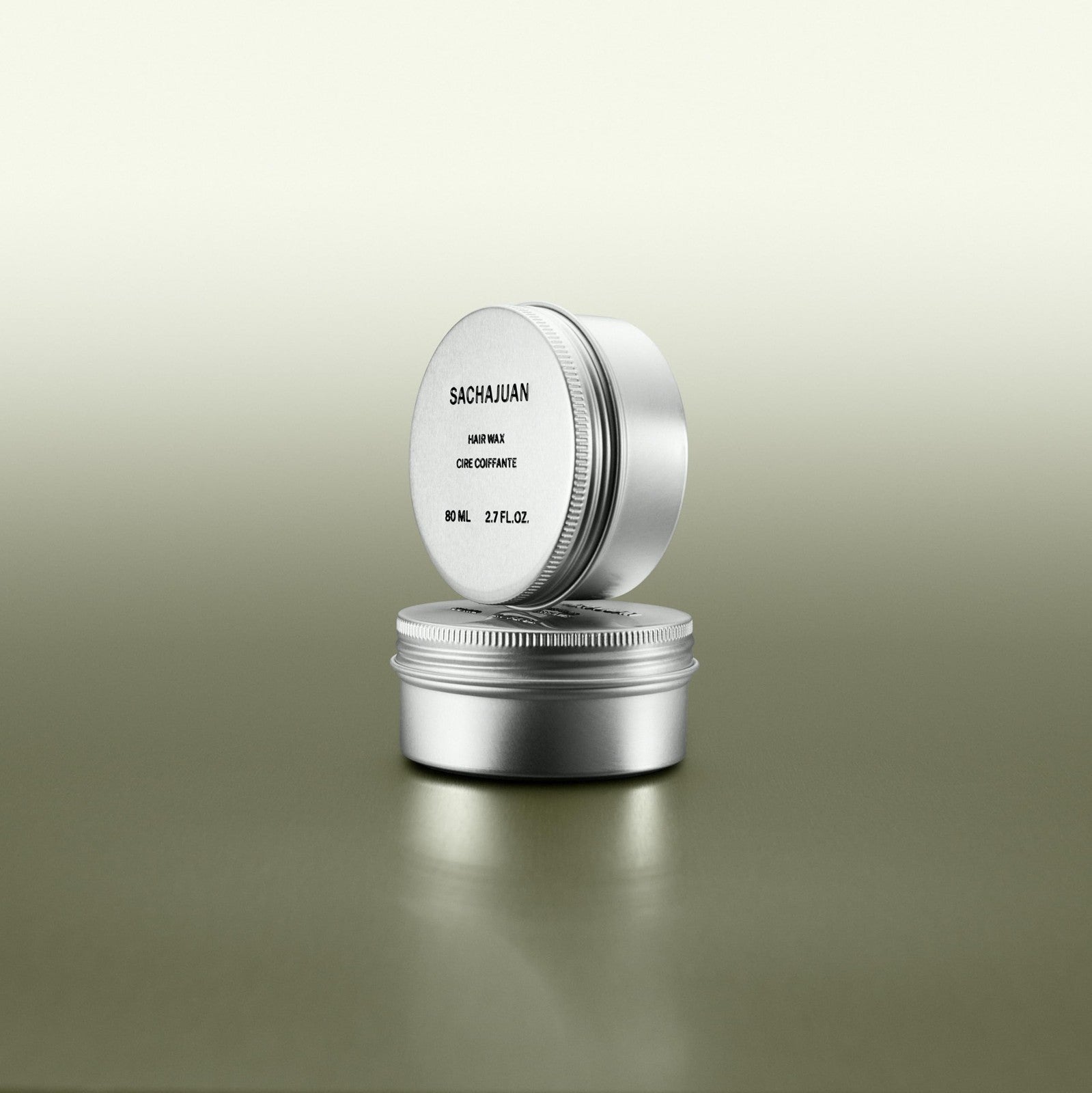 SACHAJUAN Hair Wax 80ml, showing the product container with a sleek black lid and clear label, designed for creating texture and shine.