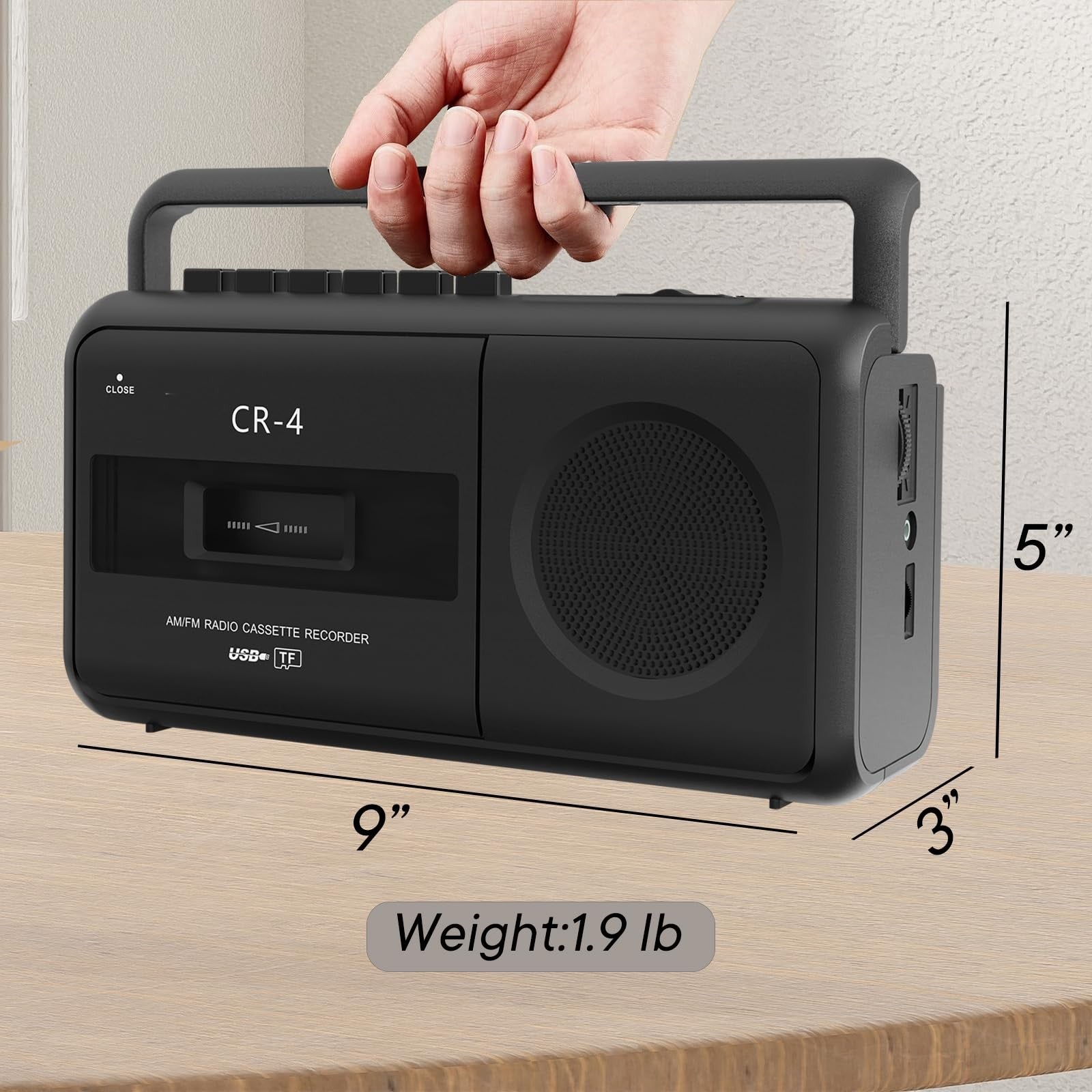 KUEPHOM portable cassette tape recorder boombox with AM/FM radio, silver design, buttons, and speaker grille visible.