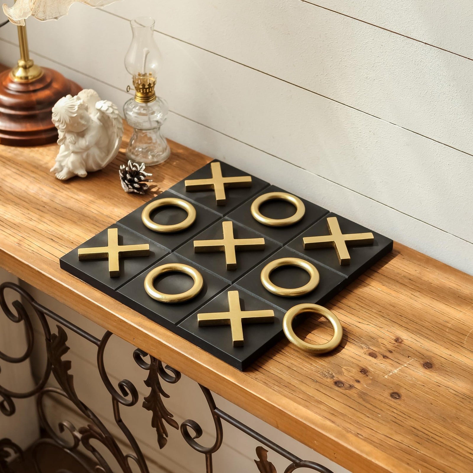 NIKKY HOME 12x12 inch wood Tic Tac Toe game board as modern coffee table decor with natural wood finish.