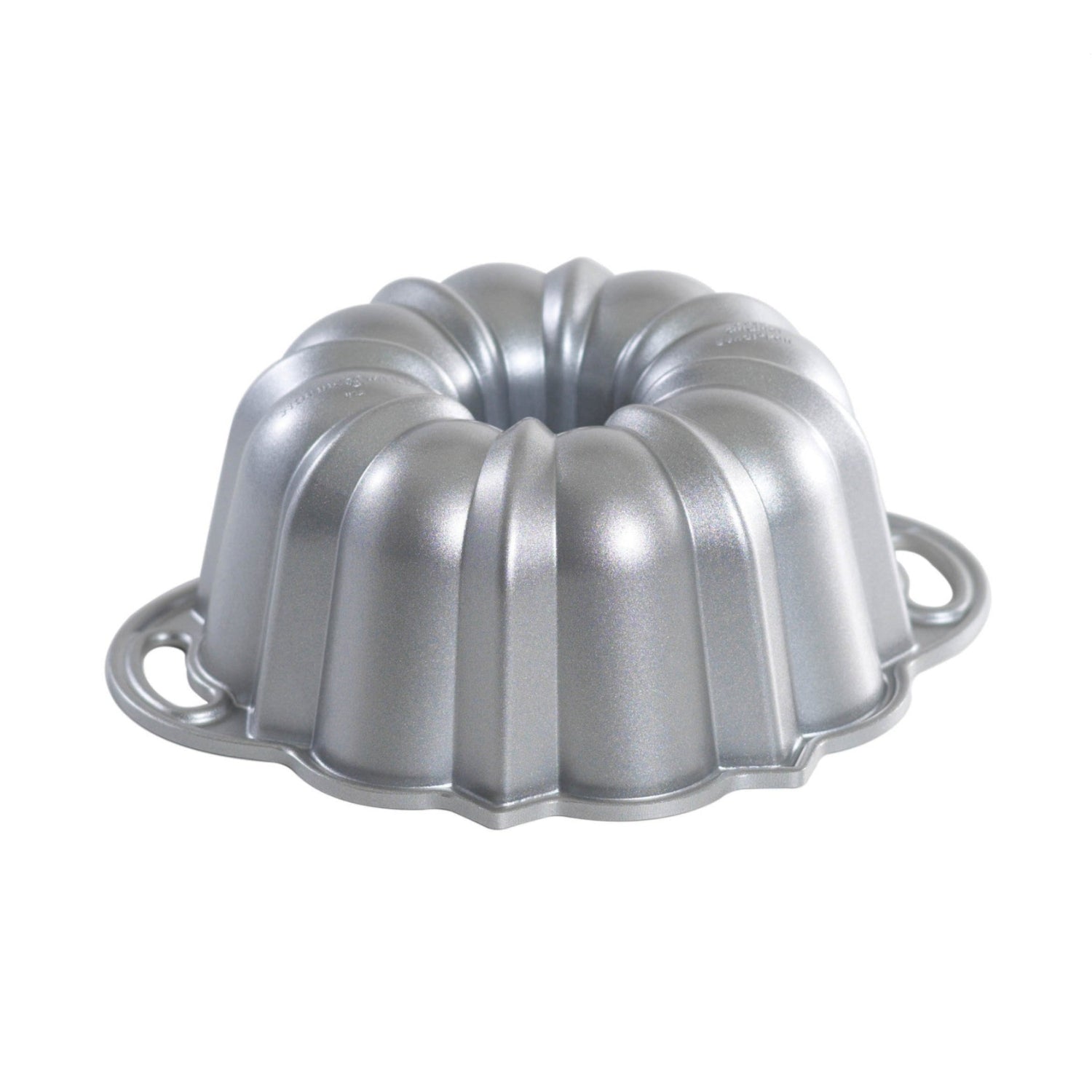 Nordic Ware Platinum Collection 6-cup Bundt pan with intricate fluted design for baking decorative cakes.