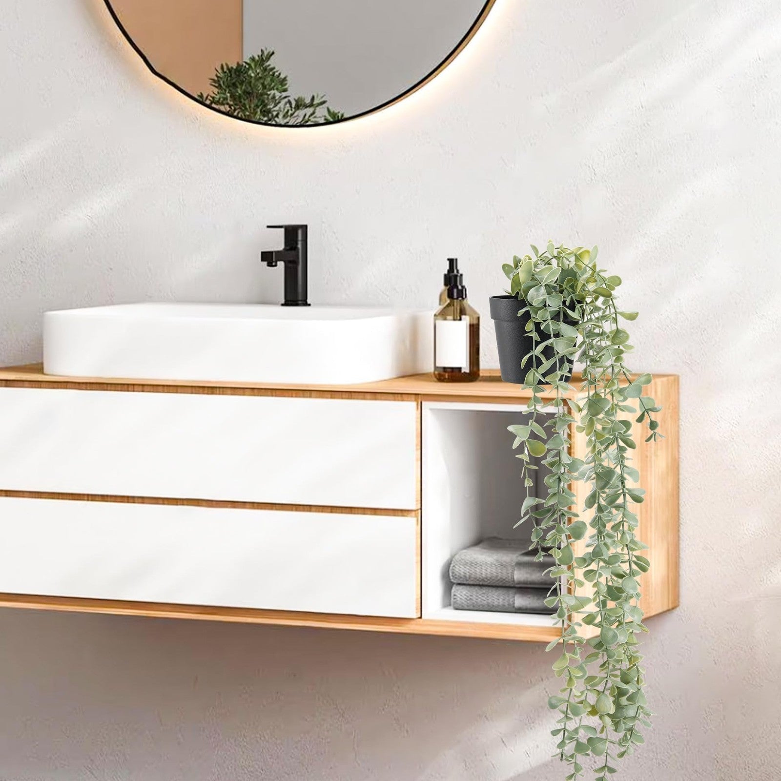 Artificial hanging eucalyptus plant by Der Rose, perfect for modern boho farmhouse decor, featuring realistic green eucalyptus leaves.