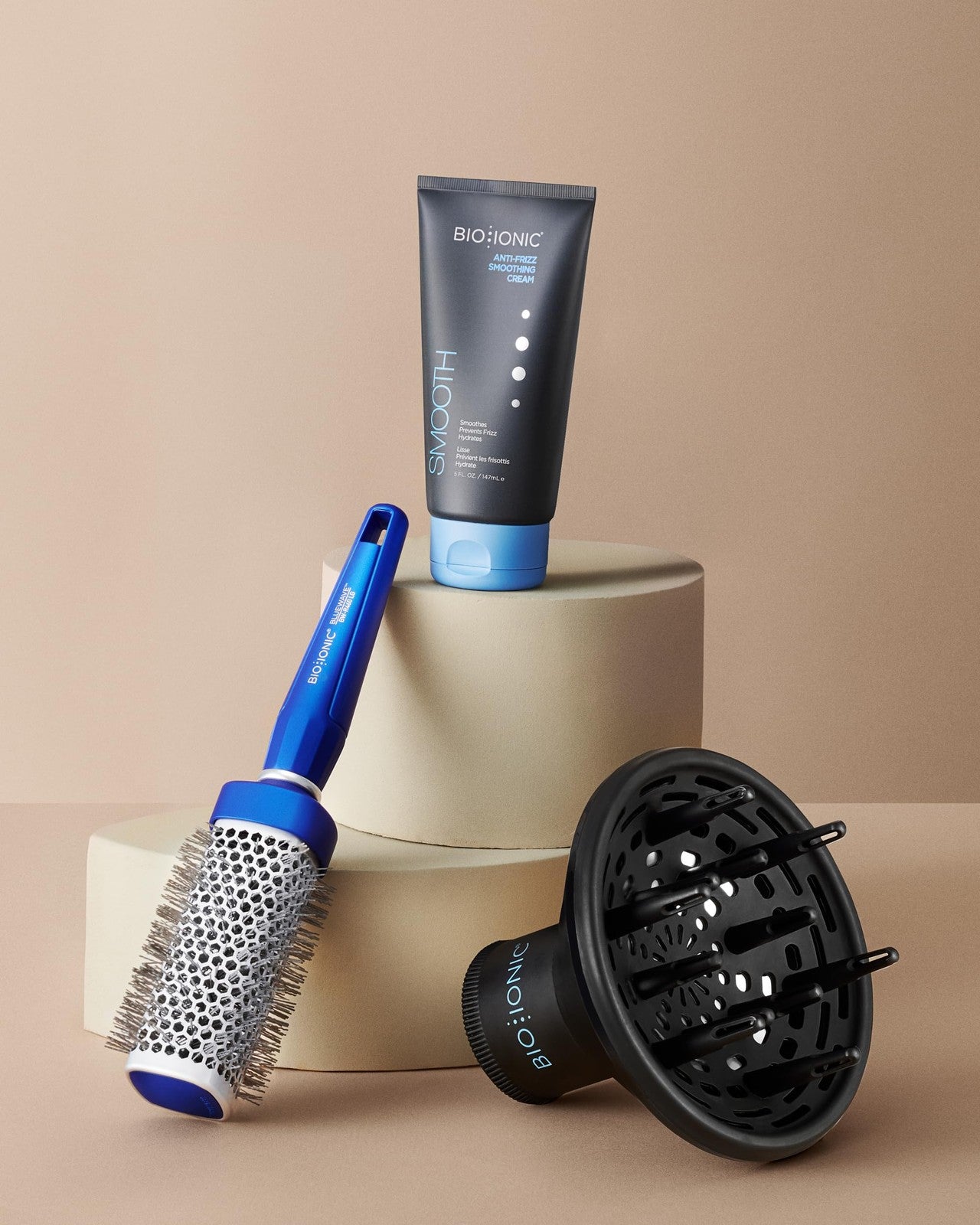 BIO IONIC BlueWave NanoIonic Conditioning Brush in medium size with sleek handle, designed to reduce frizz and add shine to hair.