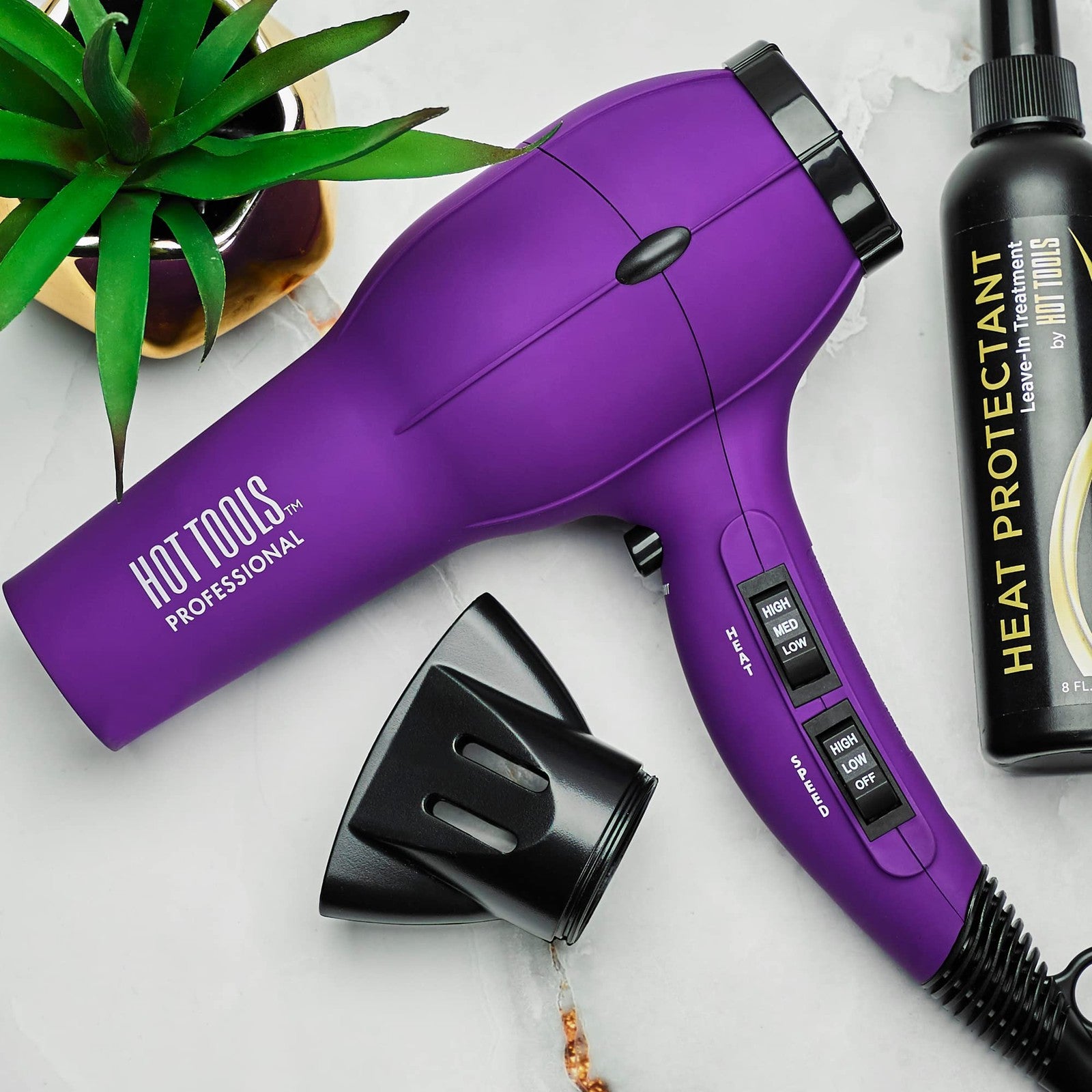 Hot Tools Pro Artist 1875W Turbo Ionic Hair Dryer with purple finish, smooth and frizz-free blowouts, professional styling tool.