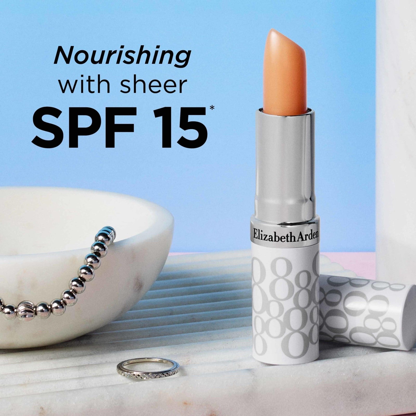 Elizabeth Arden Eight Hour Cream Lip Protectant Stick with SPF 15, showing a beige lip balm stick with sunscreen properties.