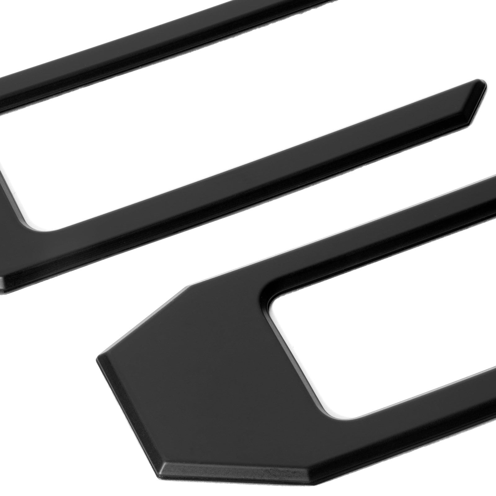 EyeCatcher Tailgate Insert Letters for 2024-2026 Toyota Tacoma, smooth satin finish, close-up of black metallic letter design on tailgate