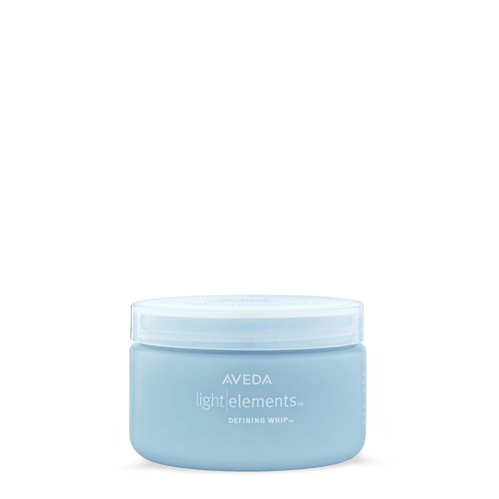 Aveda Light Elements Defining Whip hair styling wax in a jar, showcasing its lightweight texture and flexible hold for textured hairstyles.