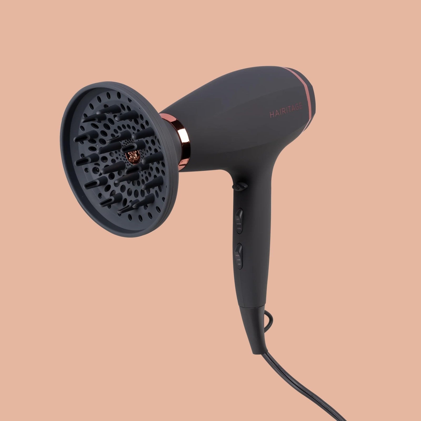 Hairitage Ionic hair blow dryer with diffuser and concentrator attachments, showcasing sleek black design and multiple styling options.