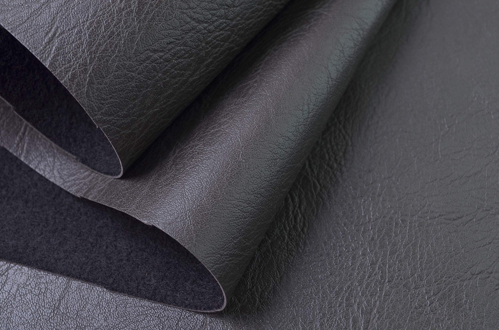 Wento thick faux leather fabric in soft skin grain, 2-yard length, showing a smooth, textured brown leather material for upholstery or crafts.