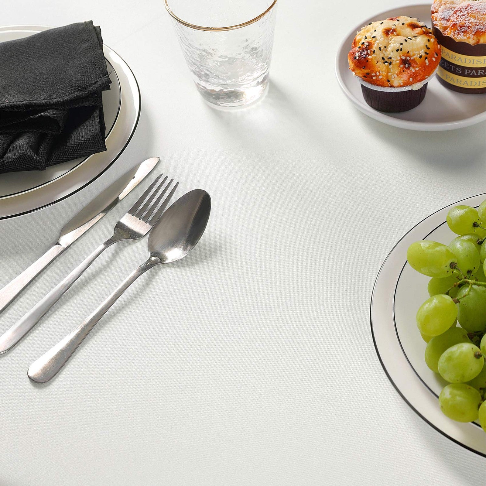 Rectangle tablecloth by Cupuamon in washable polyester fabric, measuring 60x120 inches, with a simple, elegant design.